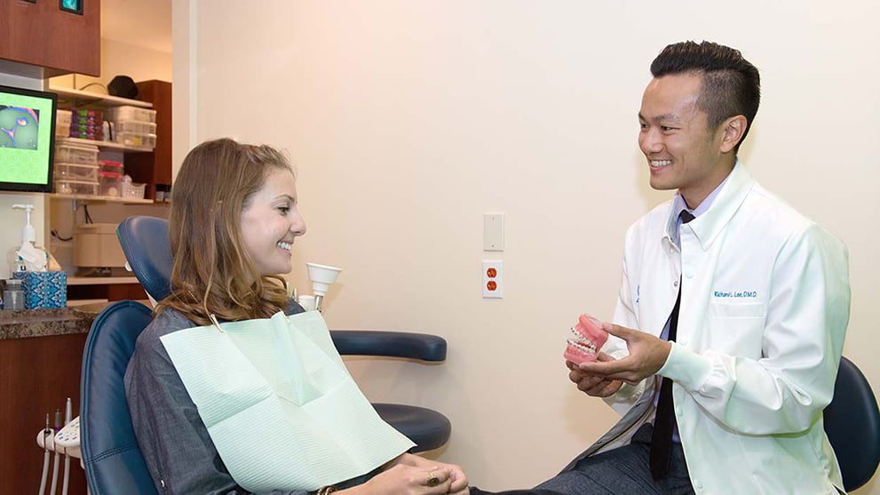 Our doctor discussing braces with a patient